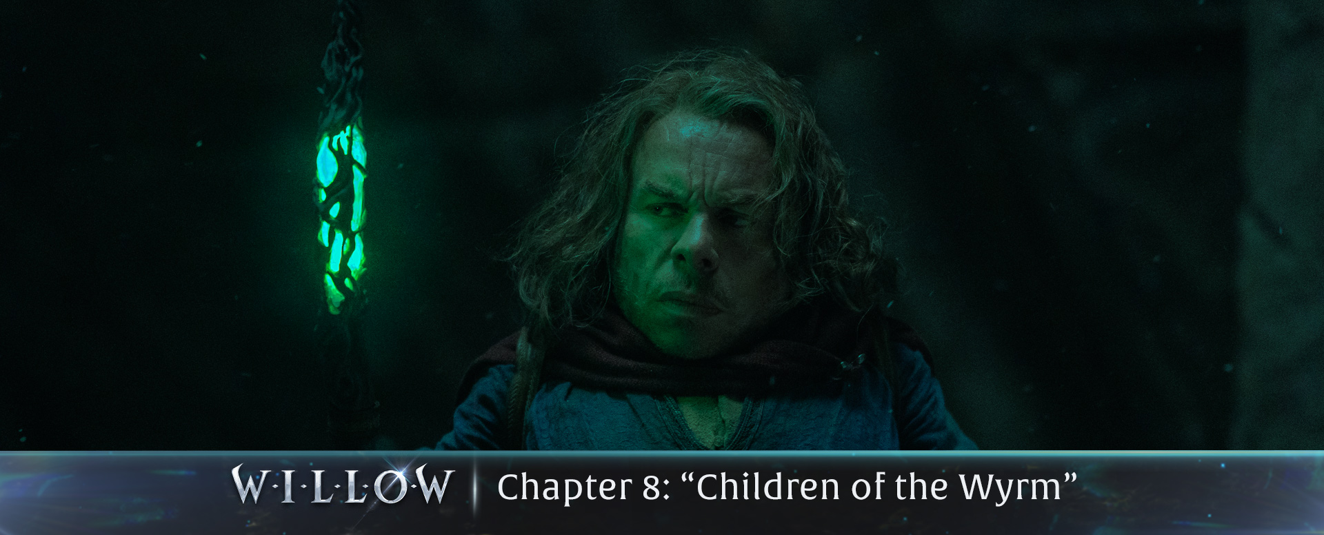 A close up of Willow and his staff