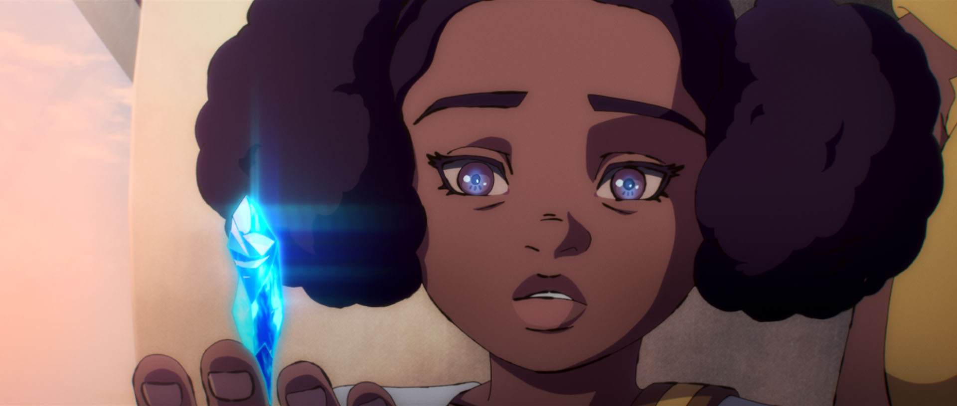 Livy holds a kyber crystal in "The Pit"