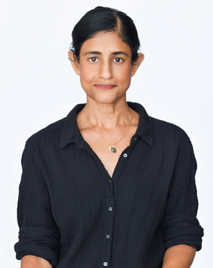 Momita SenGupta's headshot in front of a plain white background.